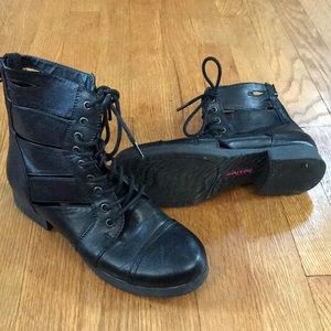 Zip up combat boots with cutouts